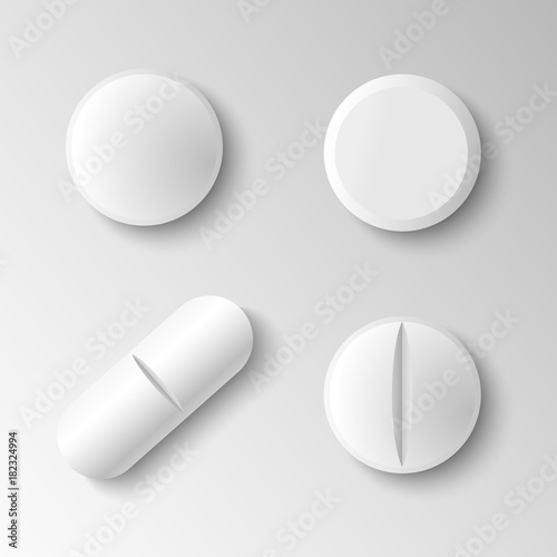Set of four different vector realistic white pills isolated on grey background
