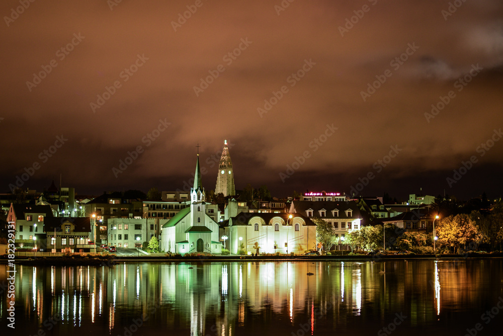 Reykjavik city seen from the pond at night