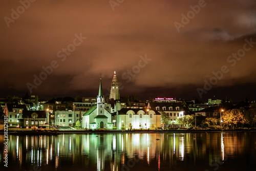 Reykjavik city seen from the pond at night