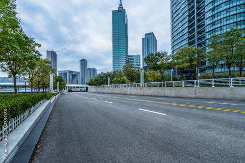 city road through modern buildings in Tianjin