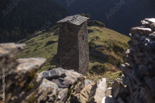 Georgian acient protection towers in causasus mountain photo