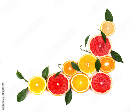 Isolated citrus fruits. Pieces of lemon  lime  pink grapefruit and orange isolated on white background  with clipping path. Top view