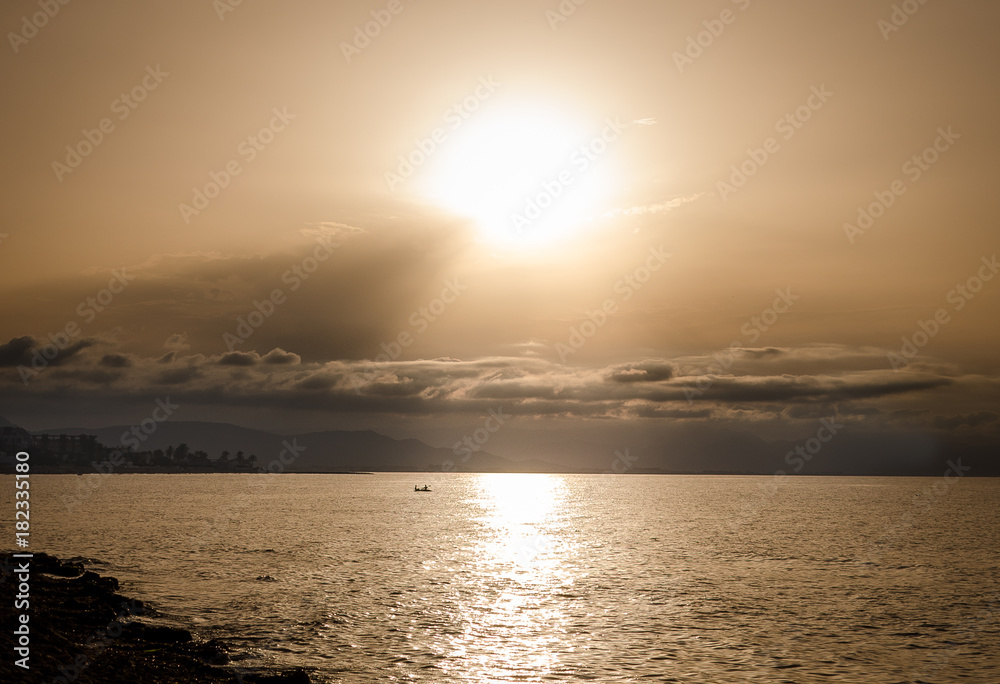 Naklejka premium sunset paddlers