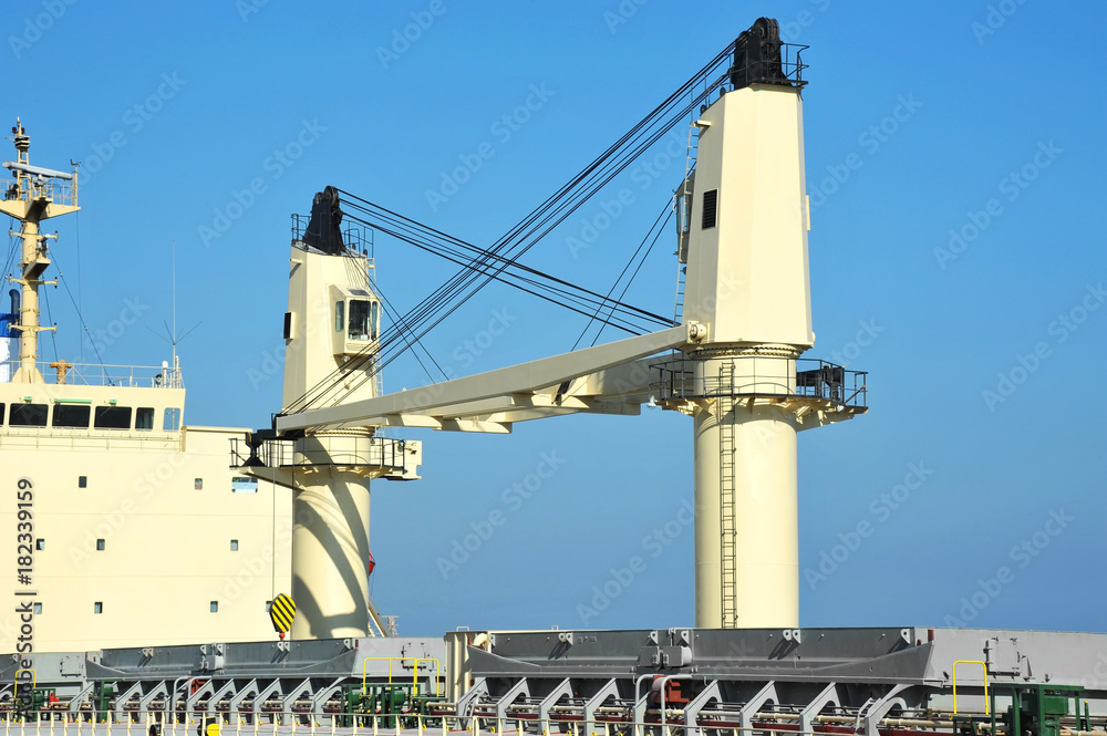 Cargo cranes on bulker