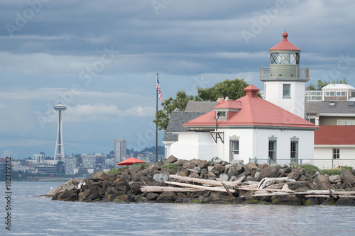Alki Point Lighthouse and Space Needle on Cloudy Day