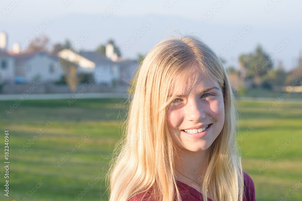 Portrait of young female at outdoors on sunny day Portrait of young female at outdoors on sunny day