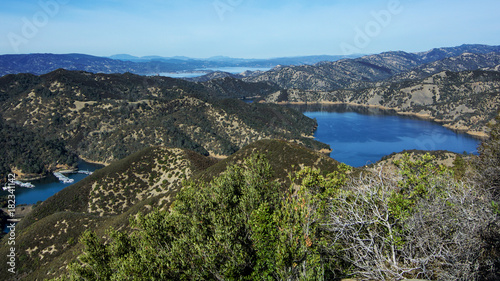 Aerial view of Lake Berryessa from the Blue Ridge Trail, Stebbins Cold Canyon, on a sunny day, featuring the surrounding blue oak woodland and the cove marina in the fall of 2017 photo