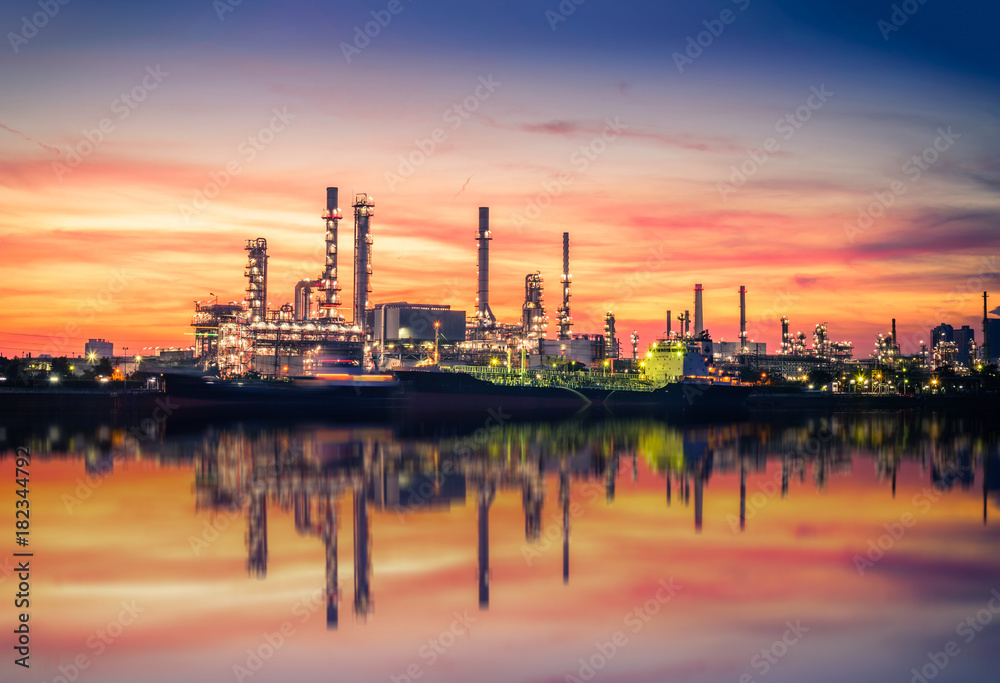 Oil and gas Refinery factory with beautiful sky at sunrise.