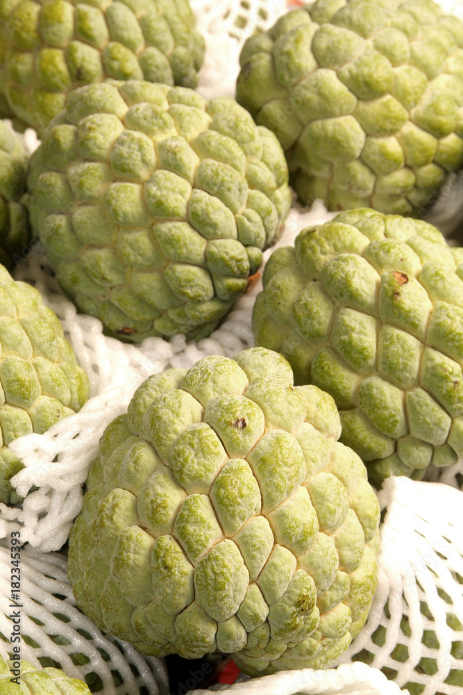Pile of sugar apples for sale at market Pile of sugar apples for sale at market
