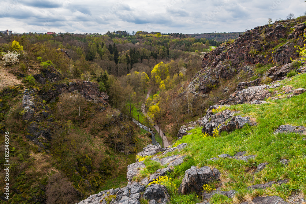 Steep rocks and valley Divoka Sarka in Prague, spring time. Wild nature park in the city. Steep rocks and valley Divoka Sarka in Prague, spring time. Wild nature park in the city.