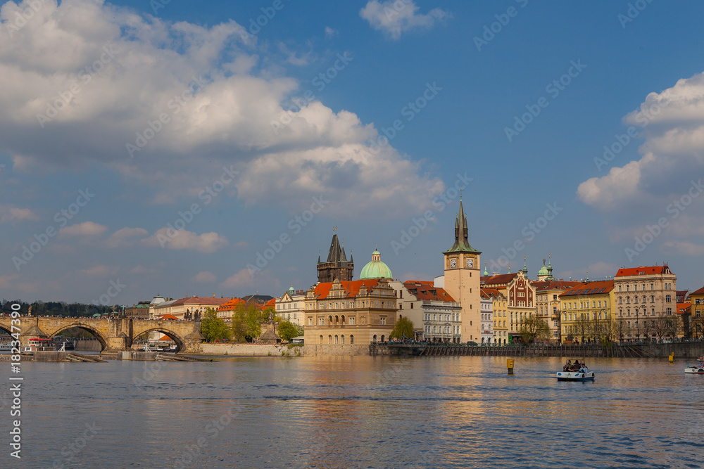 Fototapeta premium View on the river Vltava and the old town of Prague, Czech Republic, summer season, sunset time,