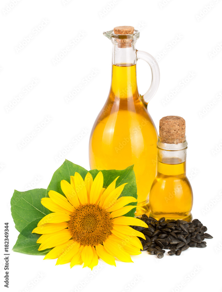 Sunflower oil, seeds and flower isolated on white background Sunflower oil, seeds and flower isolated on white background