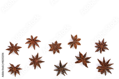 Star anise isolated on white background with copy space for your text. Top view. Flat lay pattern