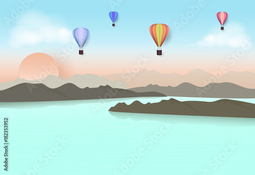 Hot air balloon travel in blue sky over the lake and mountain. Paper art, Paper cut style illustration.