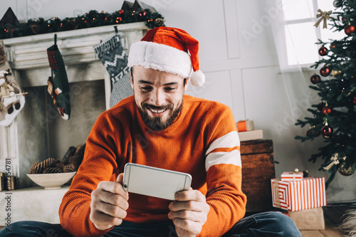 Portrait of attractive man before christmas photo