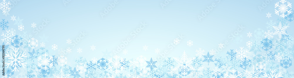Festive banner Christmas background and winter with copy space. snow and ice crystals on blue sky Festive banner Christmas background and winter with copy space. snow and ice crystals on blue sky
