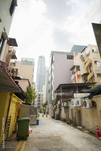 Low angle view of a empty back lane. photo