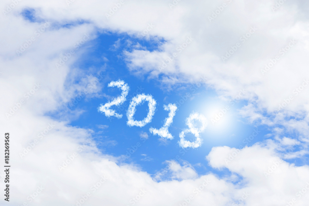 Happy New Year concept by cloud shape 2018 numbers in the clear blue sky Happy New Year concept by cloud shape 2018 numbers in the clear blue sky
