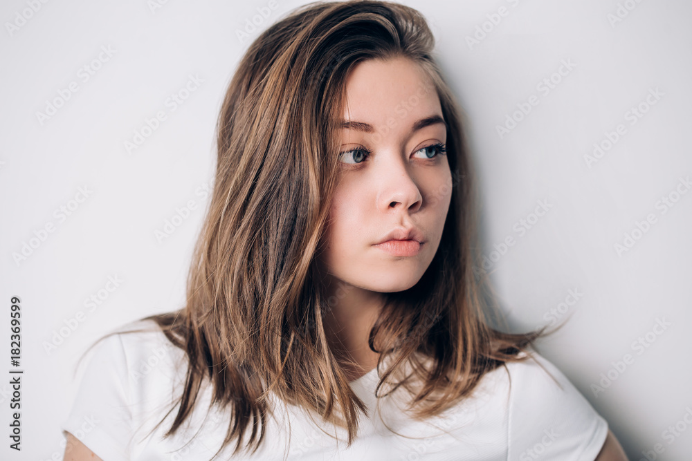 Portrait of beautiful girl posing in profile. Portrait of beautiful girl posing in profile.