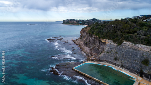 Photography Aerial view of seaside ocean swimming pool set against rock cliffs at Bilgola Be