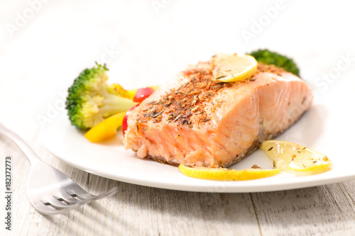 salmon cooked with spices and vegetables
