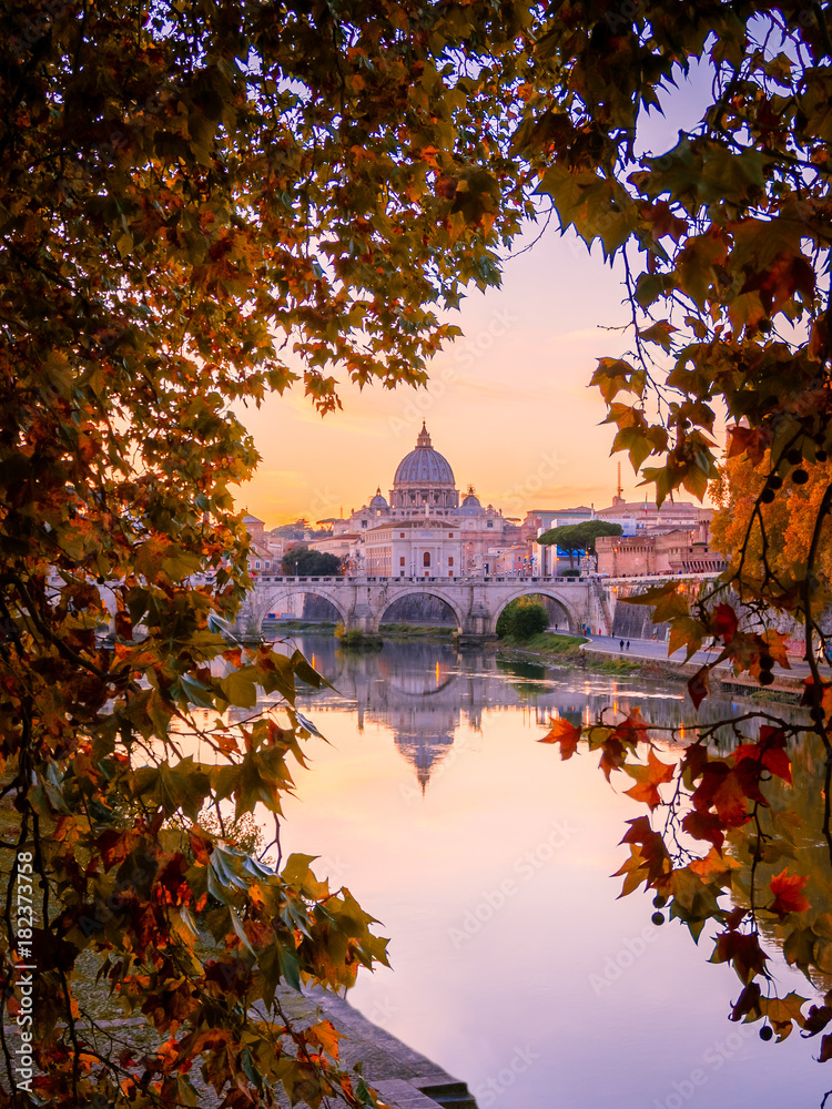 Beautiful view over St. Peter's Basilica in Vatican from Rome, Italy during the sunset in Autumn