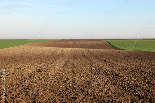 plowed field landscape autumn season photo