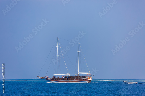 Sailing boat on tropical sea