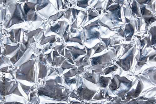 Wrinkled silver foil texture background