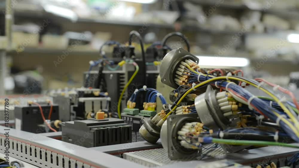 Electrical modules, switches, relays and cables are mounted on the circuit board. Electrical modules, switches, relays and cables are mounted on the circuit board.