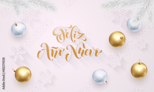 Feliz Anno Nuevo Spanish Happy New Year golden decoration  hand drawn gold calligraphy font for greeting card white background. Vector Christmas or Xmas holiday gold star shiny confetti decoration