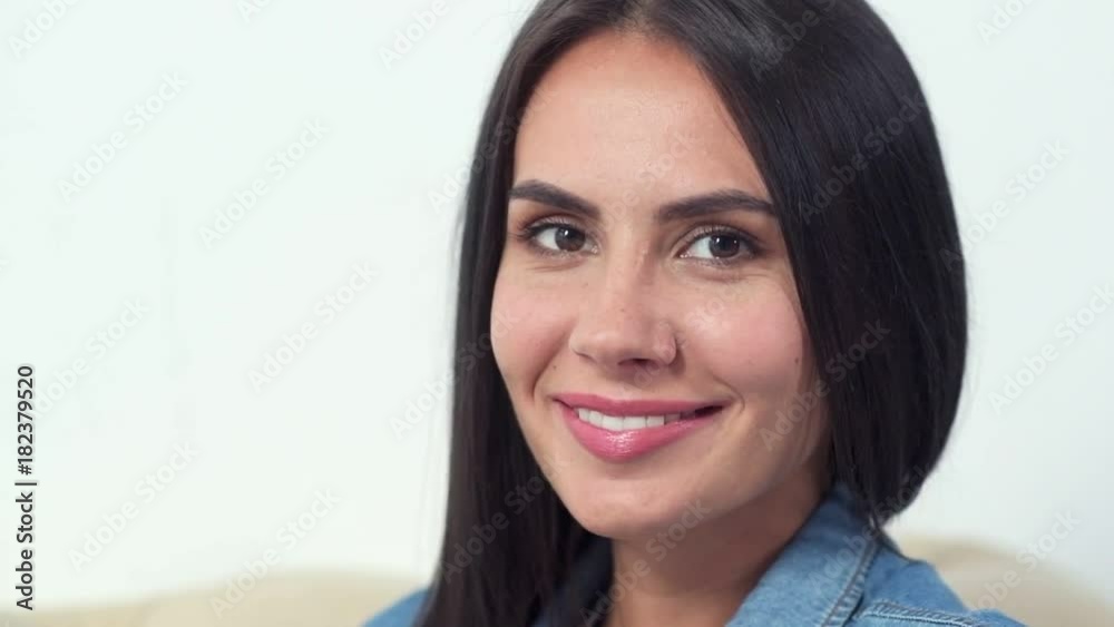 Pure positivity. Close up of a nice young beautiful woman looking at you while smiling Pure positivity. Close up of a nice young beautiful woman looking at you while smiling