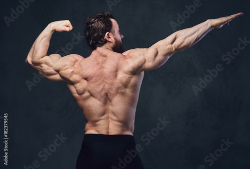 Image of a bodybuilder from a back.