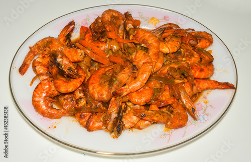 delicious homemade hot shrimp with tomato, pepper, carrot and onion