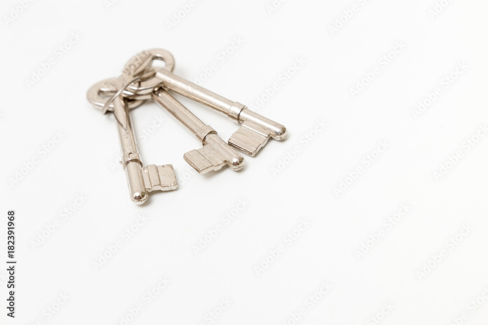 Key isolated on white background. Studio lighting. Key isolated on white background. Studio lighting.