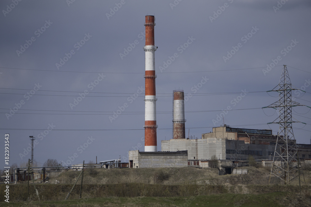 large factory chimneys white red
