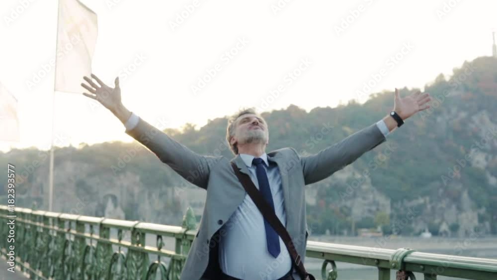 Mature businessman in a city.