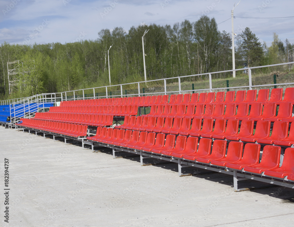 Empty tribune with on soccer stadium