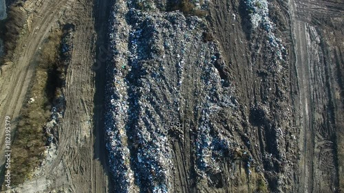 Aerial vertical shot: fly about huge dump
