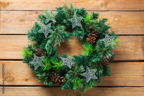 Advent christmas wooden door wreath with festive decoration