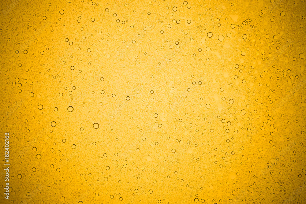 Water drops on yellow glass, Rain droplets on glass background. Water drops on yellow glass, Rain droplets on glass background.