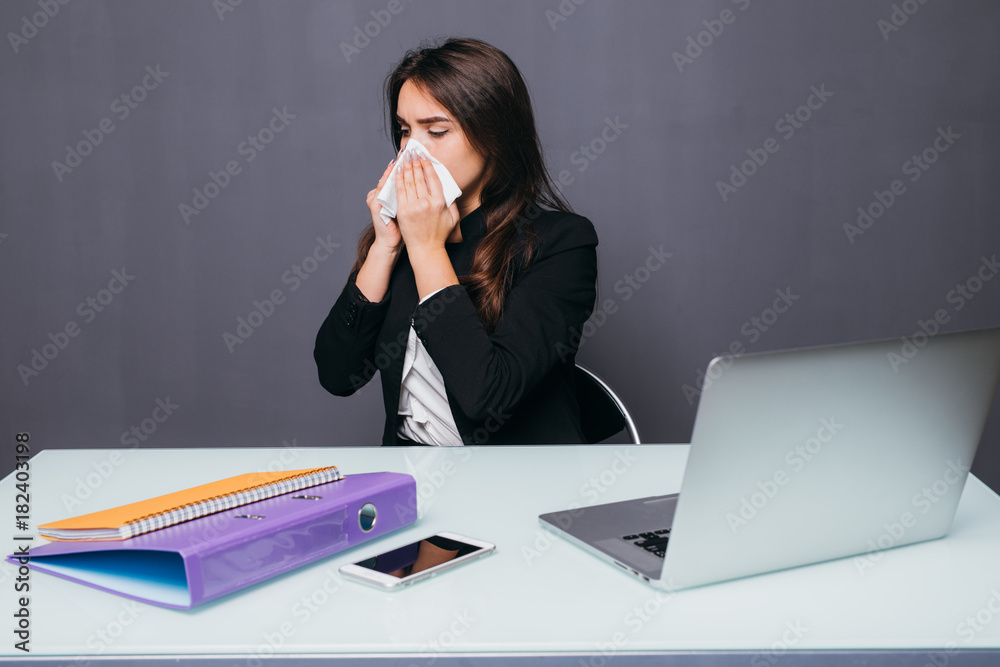 Young businesswoman get cols and sick in the office Young businesswoman get cols and sick in the office