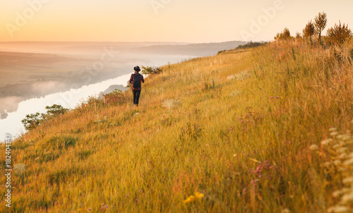 Backpacker walking in highlands