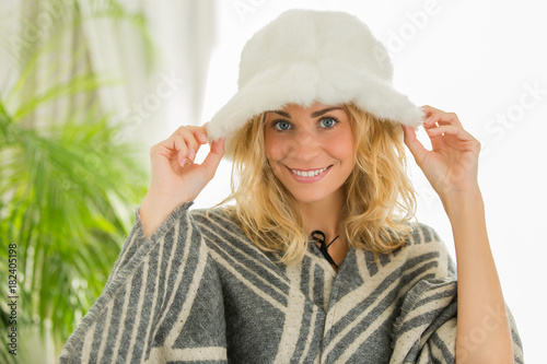 Portrait of woman wearing fur hat