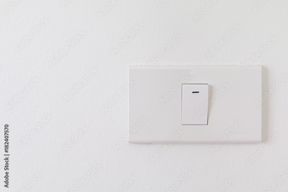 Electronic switches with white background, White switches on wall in home, Closeup switches interior. Electronic switches with white background, White switches on wall in home, Closeup switches interior.