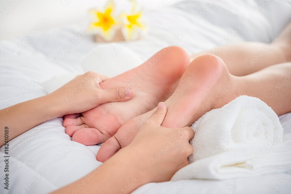 Foot massage in spa salon Foot massage in spa salon