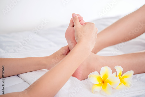 Foot massage in spa salon