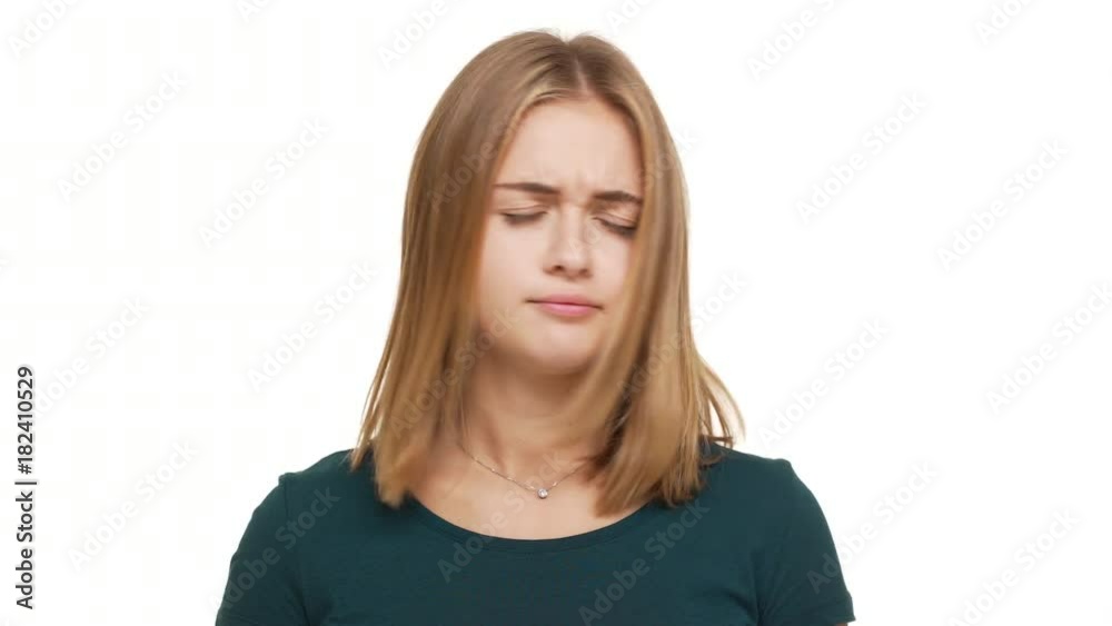 Portrait of strong-willed female person shaking head in denial not accepting proposal or expressing disagreement over white background in studio closeup. Concept of emotions Portrait of strong-willed female person shaking head in denial not accepting proposal or expressing disagreement over white background in studio closeup. Concept of emotions