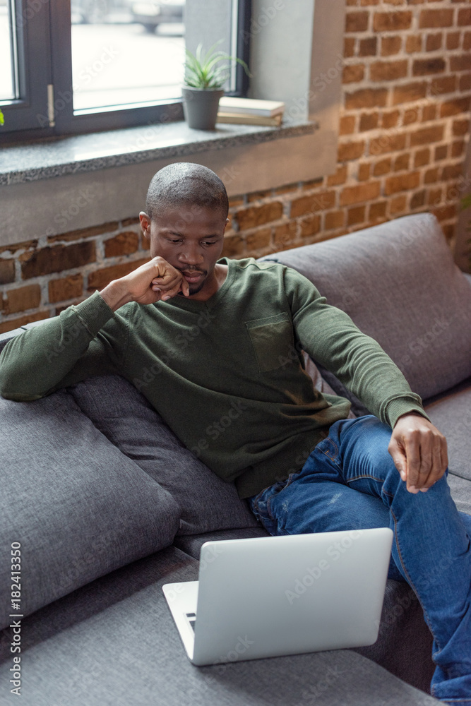 african american man with laptop