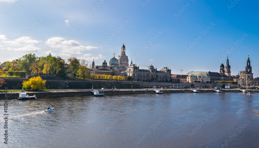 Scenic autumn view of Elbe river, Augustus Bridge and Old Town, Dresden, Saxony, Germany, Europe